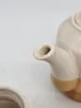 Zestaw ceramiczny: dzbanek i 6 kubków w odcieniach beżu i karmelu