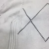 Sweter damski Bogner Fire+Ice biały zapinany 100% bawełna zielone romby